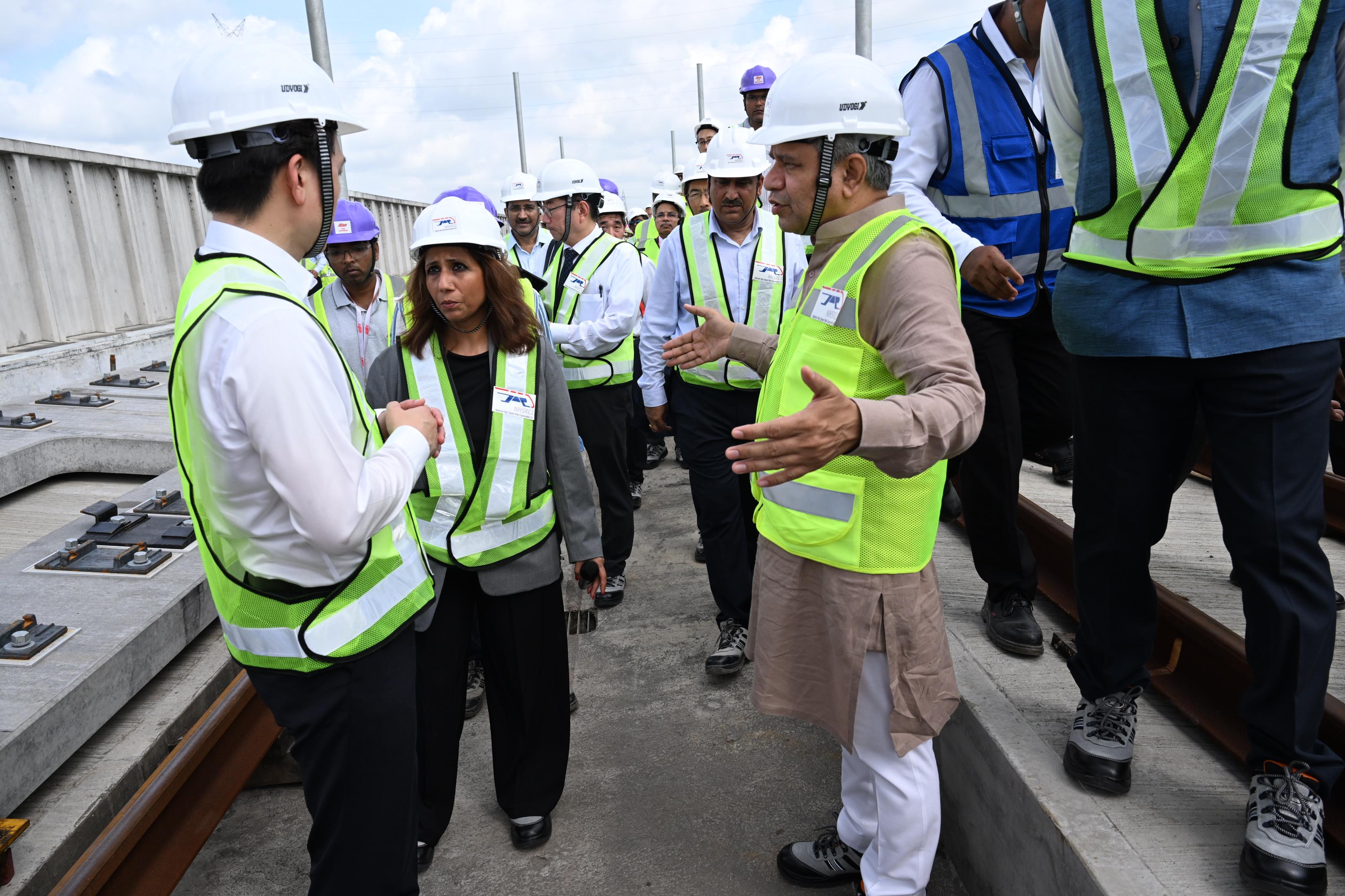 Hon’ble Minister of Railways, Shri Ashwini Vaishnaw along with Hon’ble Member of Parliament (Surat) Shri Mukesh Dalal visited under construction Surat  Bullet Train station and inspected track installation works on 27th September 2025